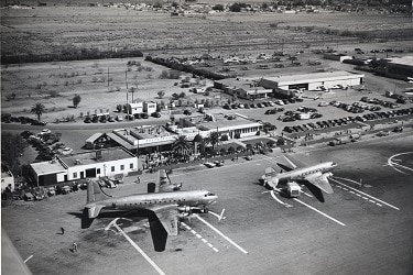 The north terminal is pictured in 1948 with an American Airlines DC-4 and another plane parked out front. (Photo courtesy of Sky Harbor International Airport).
